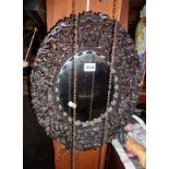 19th c. Chinese deep carved hardwood oval mirror frame