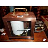 A barograph in copper case by Short & Mason of London