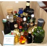 Collection of miniature bottles of spirits, whisky, rum etc, together with a 1999 bottle of Thomas