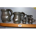 Collection of Victorian pewter pub measures