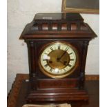 Edwardian carved walnut mantle clock