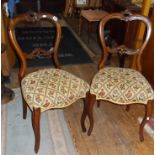 Pair of 19th c. walnut balloon-back dining chairs on cabriole legs