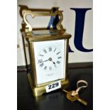 Allen & Daws of Norwich brass carriage clock with French movement (working)