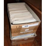 Two boxes full of unsorted postcards