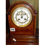 Edwardian mahogany dome topped mantle clock with inlaid decoration and visible escapement