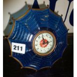 Early 20th c. Coca Cola Art Deco advertising clock with blue glass surround in the form of an open