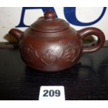 Chinese Stoneware Yixing teapot and cover with moulded decoration