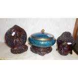 Hardwood buddha head, cloisonne lidded bowl on carved wooden stand and another buddha figure