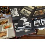 Eight assorted scrap books of photographs and postcards, together with a collection of 1st Day issue