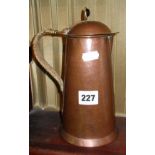 Keswick Arts & Crafts beaten copper lidded jug