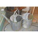 Two watering cans