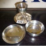 Three pieces of hallmarked silver, an egg cup and two dishes, approx 8 troy oz