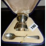 Silver double ended egg cup in case with matching spoon, hallmarked for London 1909