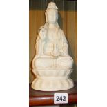 Chinese blanc de chine figure of Guan Yin seated on lotus flower, 25cm