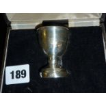 Silver egg cup in case (hallmarks rubbed)
