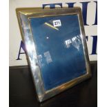 Large hallmarked silver photograph frame with easel back