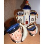 Larger and smaller Captain Ahab toby jugs by Royal Doulton, and a Staffordshire house