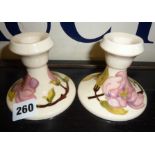 Pair of Moorcroft Magnolia pattern candle holders