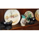 Two Victorian black glazed cow creamers (1 A/F), three Doulton Series ware plates, a Continental