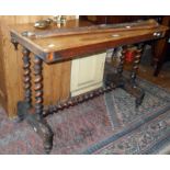 Victorian cross banded walnut stretcher table of barley twist turned supports