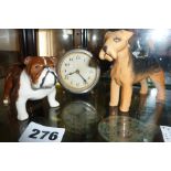 Beswick bulldog "Bosun" and an Airedale Terrier, together with an old travel clock