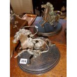 Pair of small bronze Marley horses on wooden bases