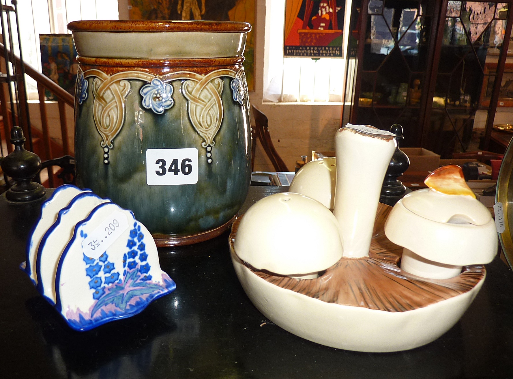 Carltonware "mushroom" cruet set, small Carltonware toast rack and a Doulton stoneware tobacco jar