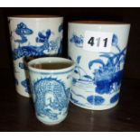 Two Chinese Jingdezhen blue and white porcelain brush pots and a small porcelain dragon cup