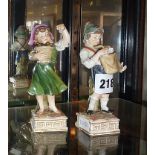 Pair of 19th c Volkstedt porcelain figurines of children (small chips)