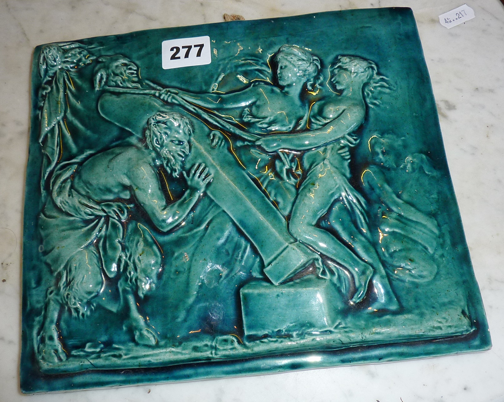Continental blue glazed ceramic relief panel of a Satyr & Nymphs