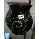 Brannam of Barnstaple Art Pottery tube-lined iridescent vase decorated with a spiral design, c.