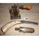 Joseph Rodgers equestrian hoofing knife, shotgun cartridge reprimer on cast iron base, and an
