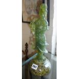 Oriental carved greenstone figure of a geisha standing on green marble base