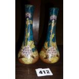 Rozenburg Art Pottery Art Nouveau pair of posy vases decorated with thistle type flowers, some