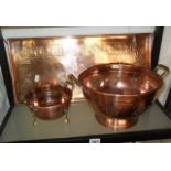 Two copper colanders and an embossed copper rectangular tray
