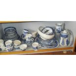 Large quantity of willow pattern dinner & teaware