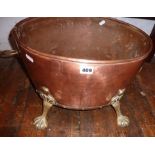 Arts & Crafts style hammered copper large jardiniere with brass lion's paw feet