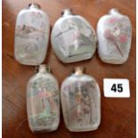 Five Chinese crystal reverse painted snuff bottles