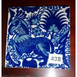 William de Morgan type blue and white tile decorated with a griffin type creature (unsigned), some
