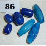 Four Tibetan natural lapis lazuli Dzi beads and three natural blue agate Dzi beads