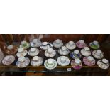 Collection of 23 assorted bone china coffee cans and saucers