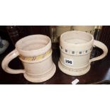 Two early Poole pottery tankards