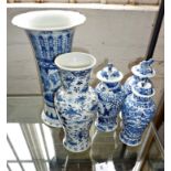 Pair of Chinese porcelain blue & white vases with covers, another similar, and two other blue &