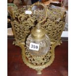Victorian heavy glass inkwell on ornate brass stand with letter rack stamped T & T for Townshend &