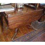 Victorian mahogany Pembroke table with drawer on centre column above platform base with four