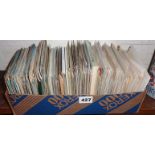 Box containing unsorted vintage and older postcards