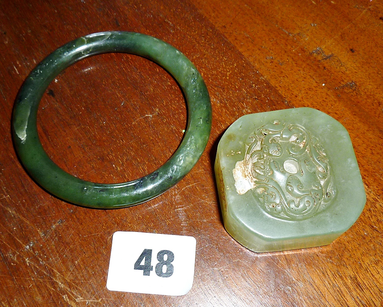 Chinese carved jade seal and a bangle