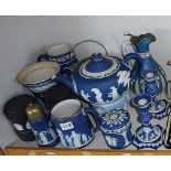 Good collection of Wedgwood dark blue Jasperware, inc. pair of candlesticks, teapot, water jug