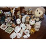 Quantity of china and resin ornaments inc. owl figurines etc.
