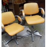 Three designer hairdresser's/barber's chairs